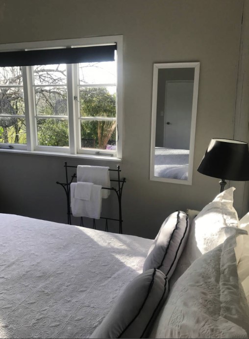 Afternoon sun in front queen bedroom