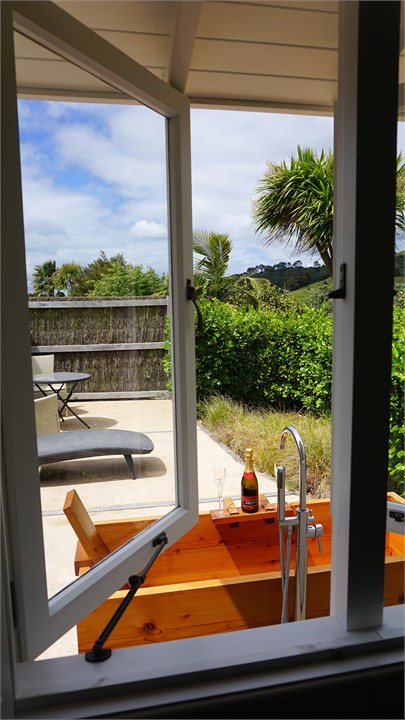 Out bedroom window towards bath