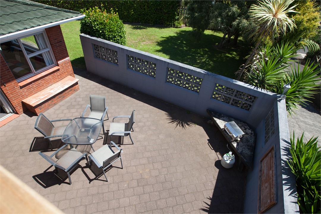View from upstairs onto outdoor dining area