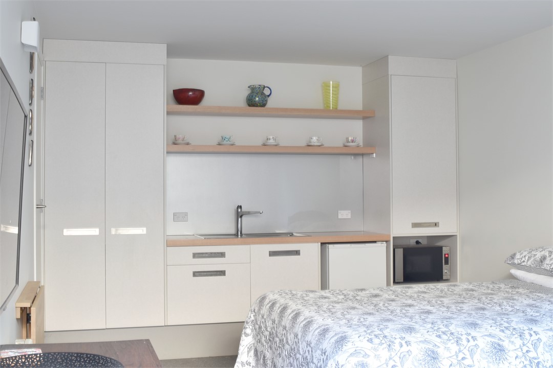 Days Bay Studio Accommodation: Open plan kitchen,