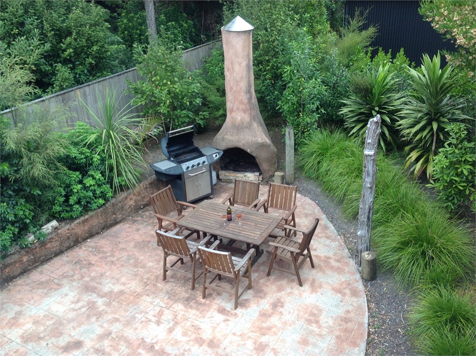 Rear of house private NZ native plant garden