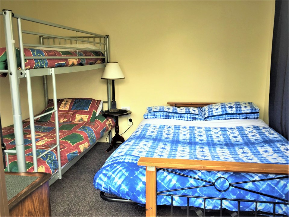 Sleepout with two single bunk beds and double futo