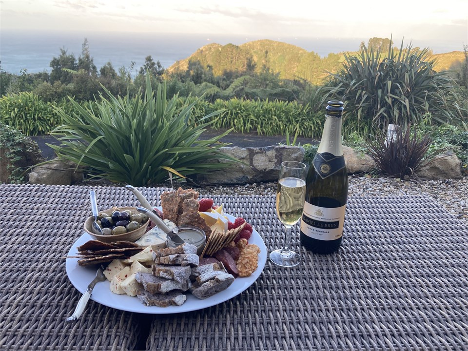 Enjoy a welcome platter and wine on arrival