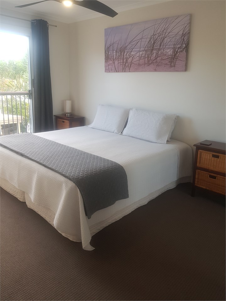 2nd Bedroom with King Bed or 2 singles.