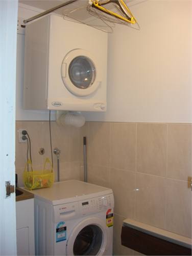 Laundry/Drying room with washing machine and dryer