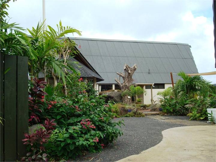Our "Rustic beach house" with natural landscaping