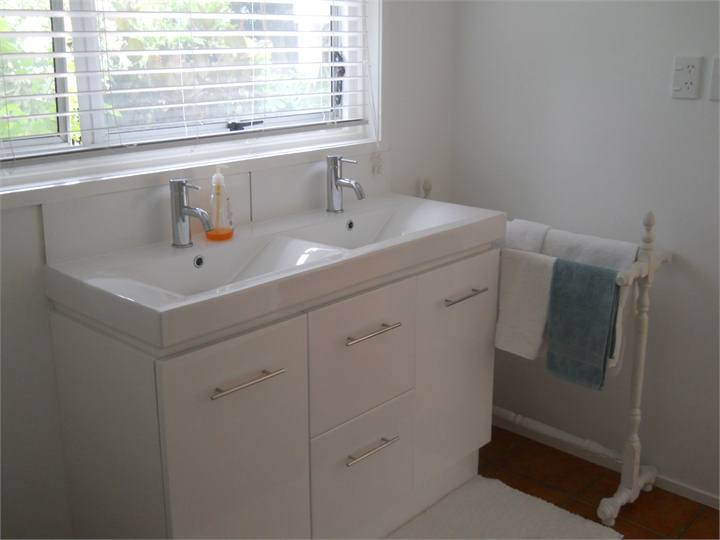 downstairs bathroom with shower and toilet