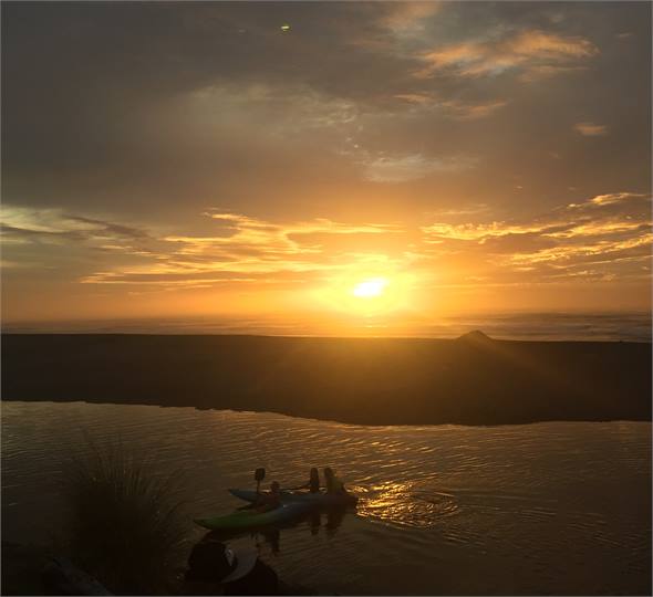 KAYAK AT SUNSET