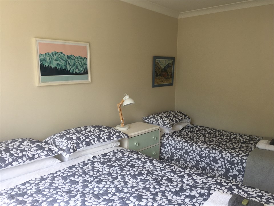 Bedroom 2.  1 Queen, 1 single.