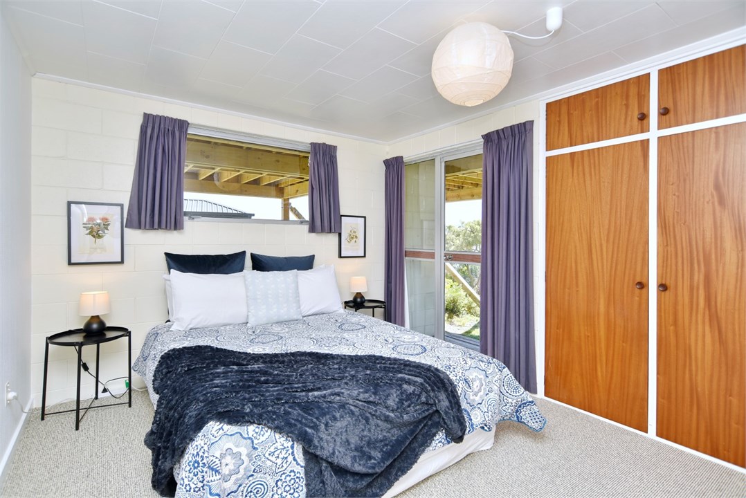 Bedroom 2 has a Queen sized bed