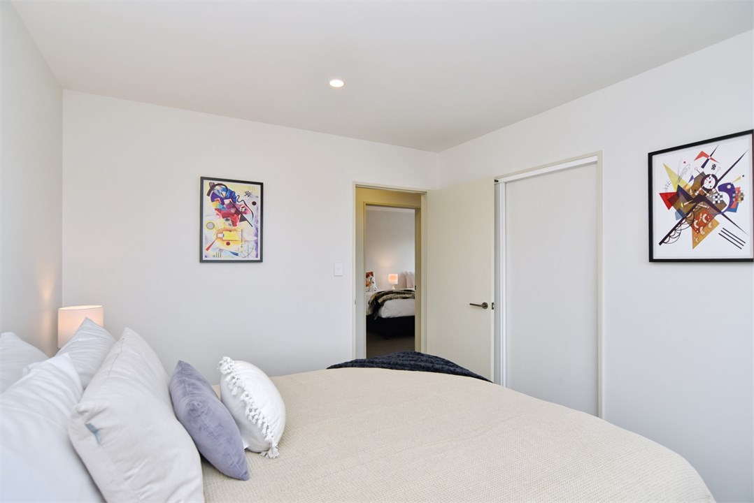 Bedroom 3 has a Queen bed