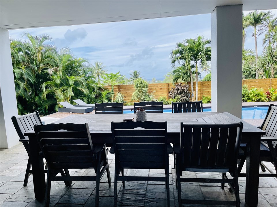 Ground Floor Outdoor Dining Area overlooking Pool