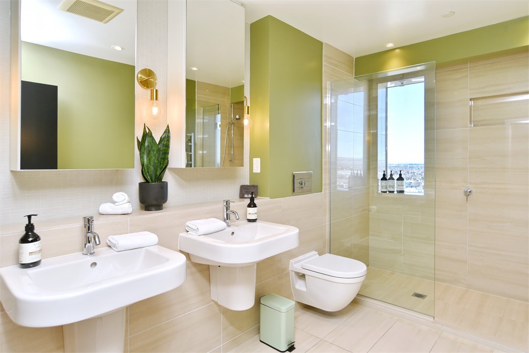 Bathroom 2 has a shower and a toilet