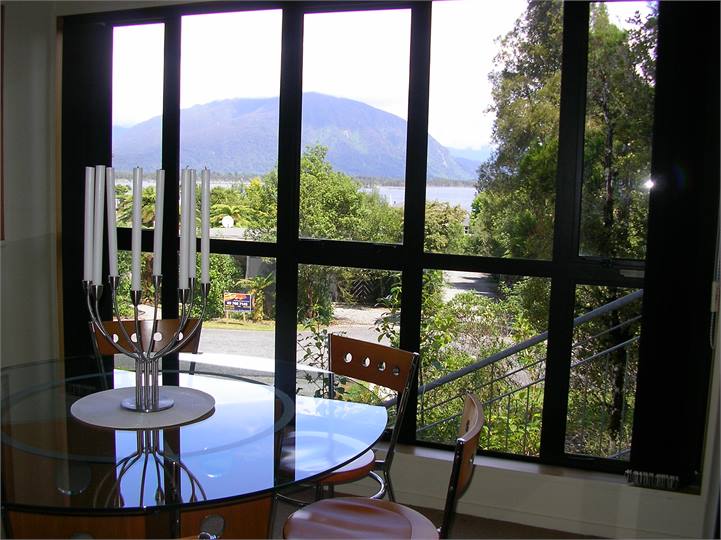 Dining area with BiFold Doors to the All Weather D