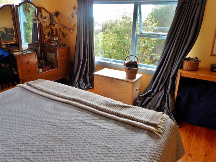 The Gate House master bedroom upstairs. Sea glimps