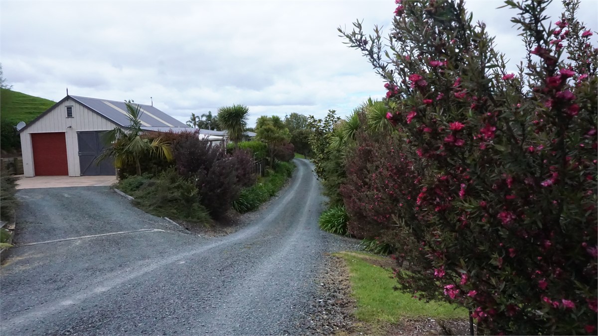 Driveway to the left, towards the barn apartment