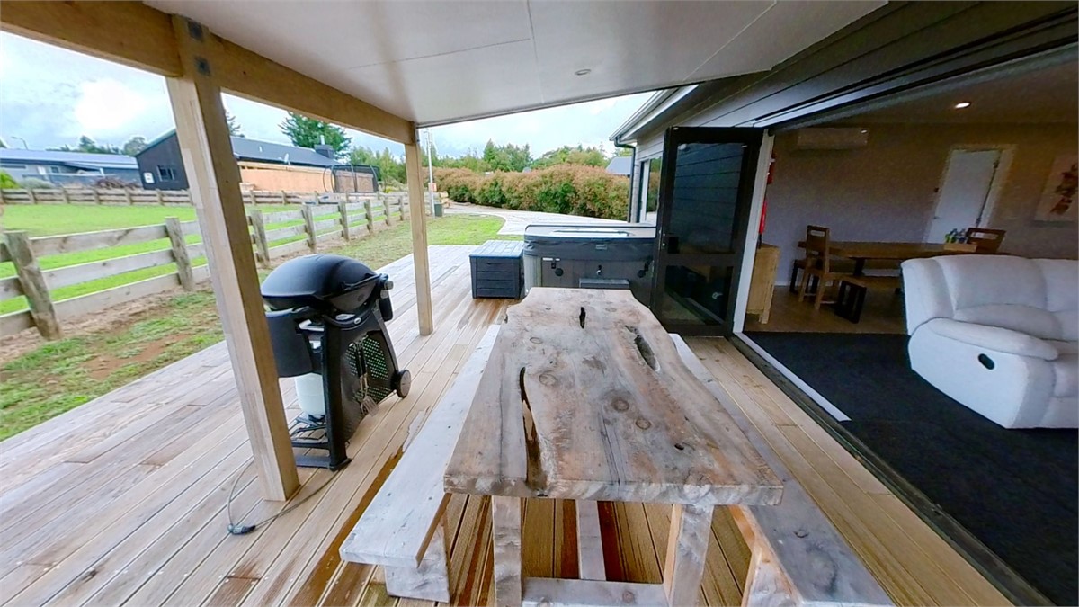 Outside covered deck with webber gas bbq and spa p