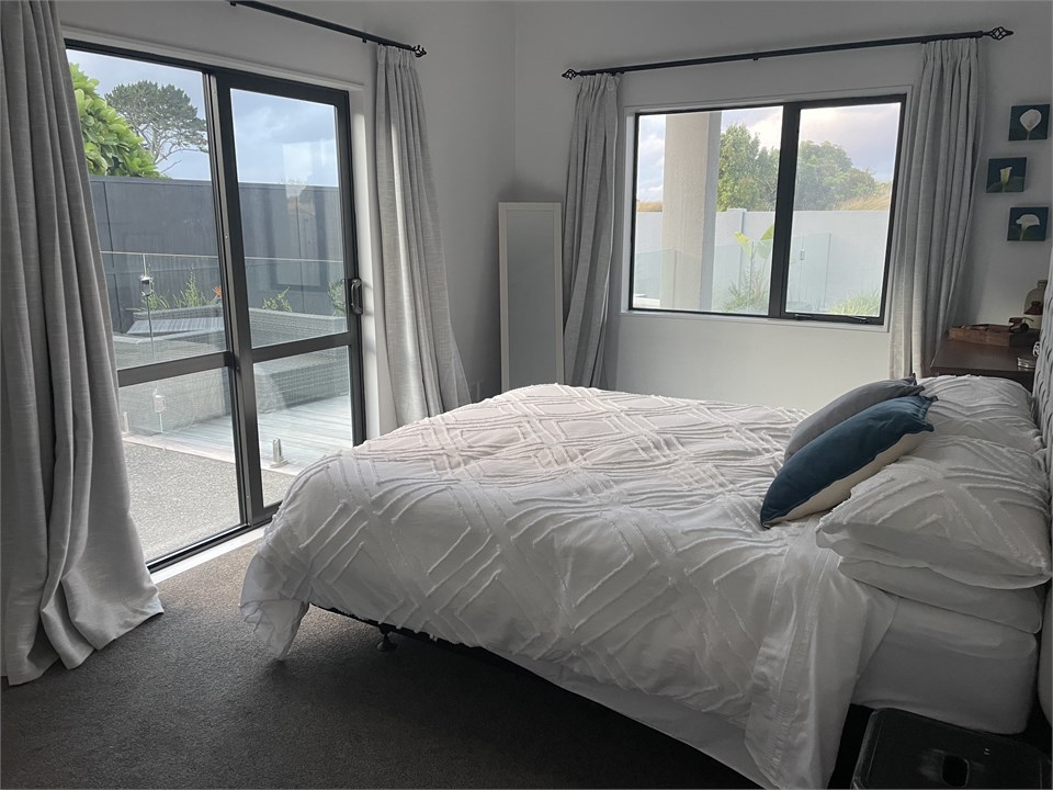 Downstairs guest room, queen bed, ranch slider acc