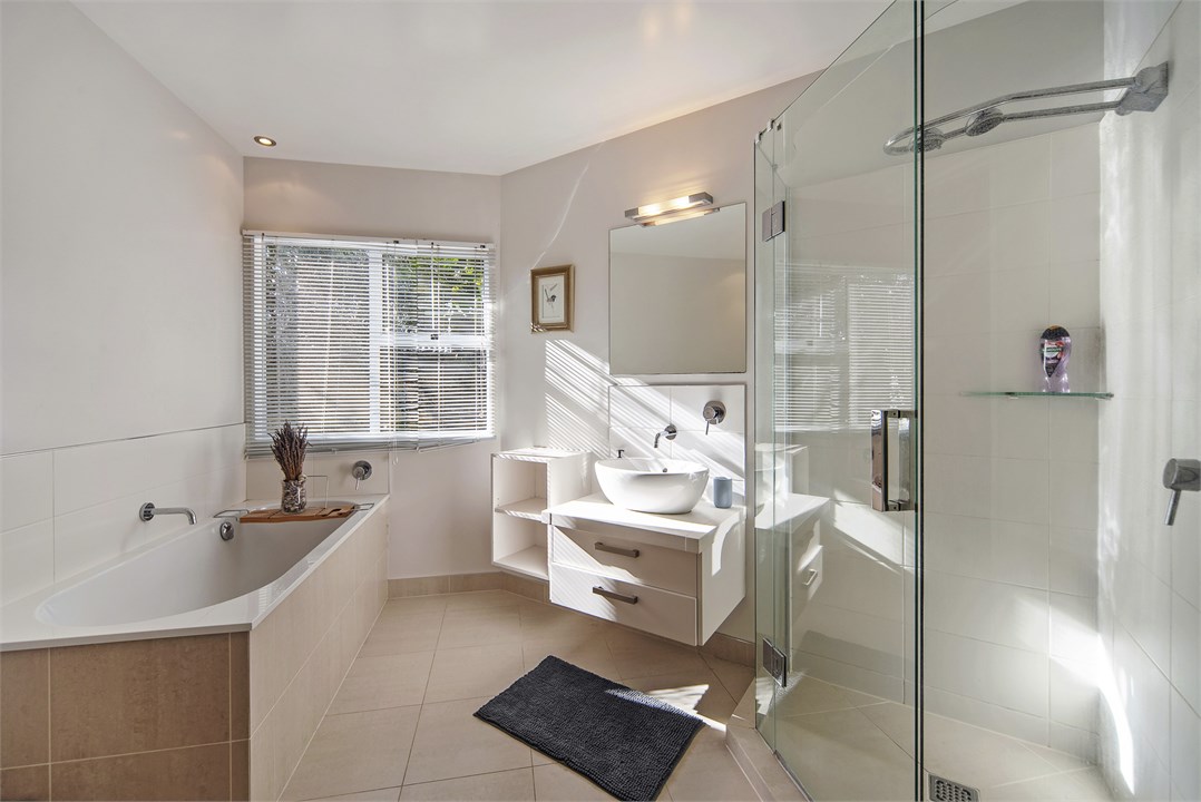 Main bathroom with Shower, Separate Bath & Toilet