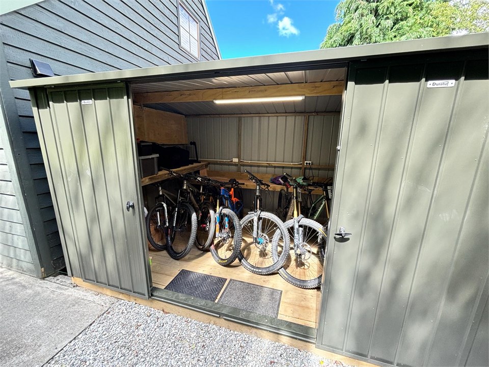 Large secure powered storage shed for all your bik