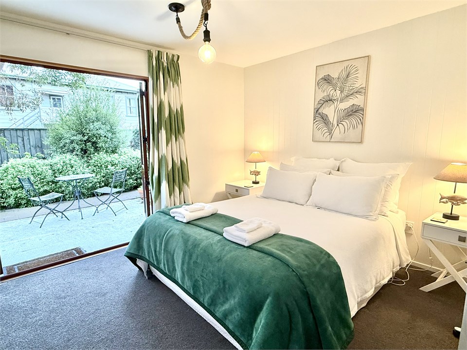 Bedroom 2 on the 1st floor with a Queen bed