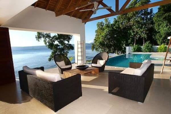 Poolside lounge area in pavilion