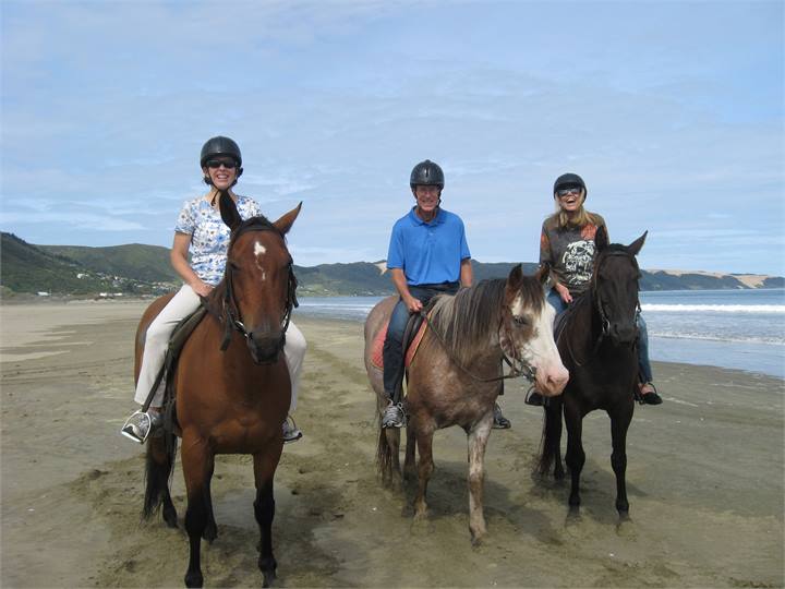 Surfers, Quad Bikes + Horses Enjoy the Beach