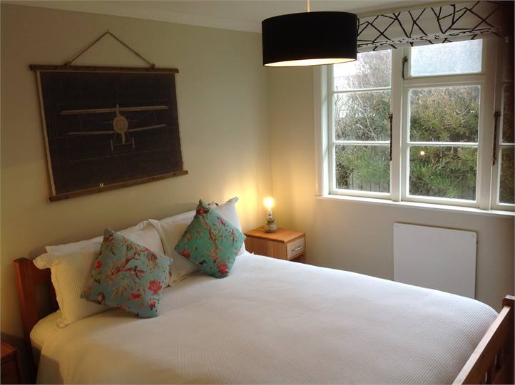 Bedroom 2: Queen Bed.