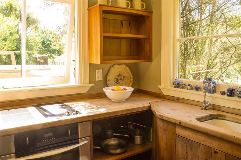 A quaint place to cook, surrounded by nature.