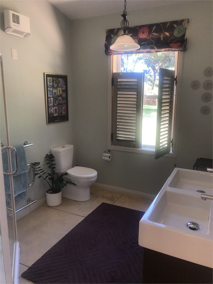 Bathroom with shower and double basin