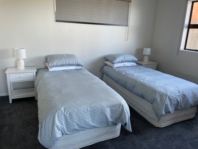 Downstairs. Bedroom 3:  2 single beds; can be conv