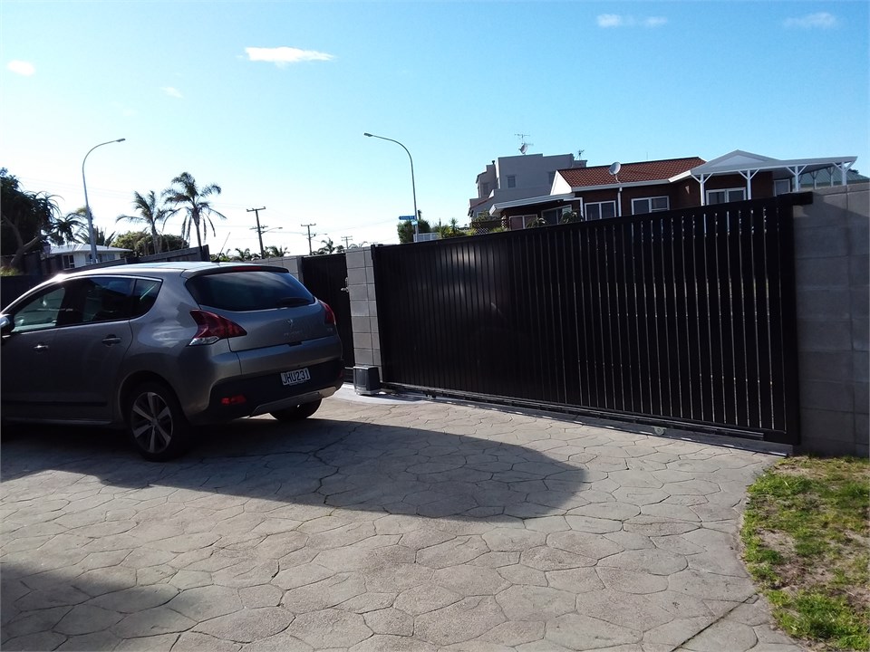 Security gate with parking inside for two cars
