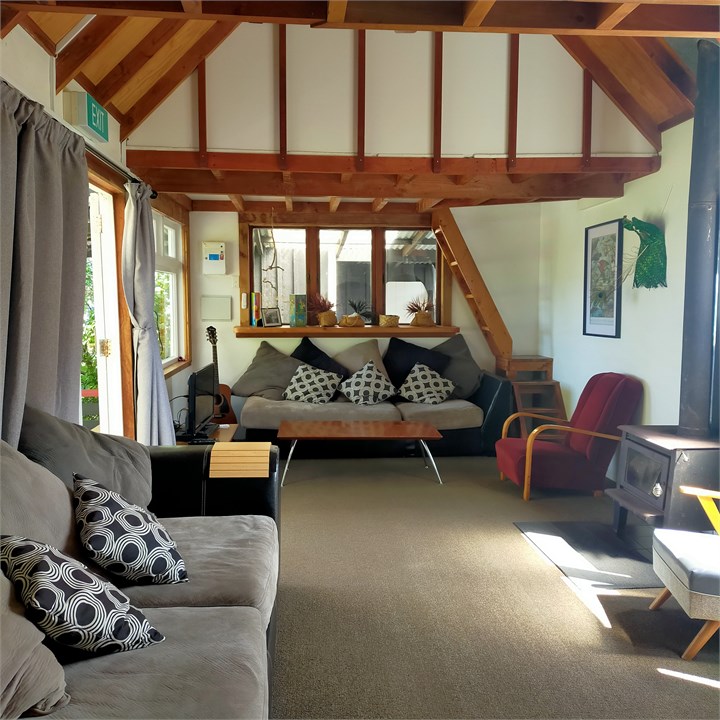 Lounge showing loft anove