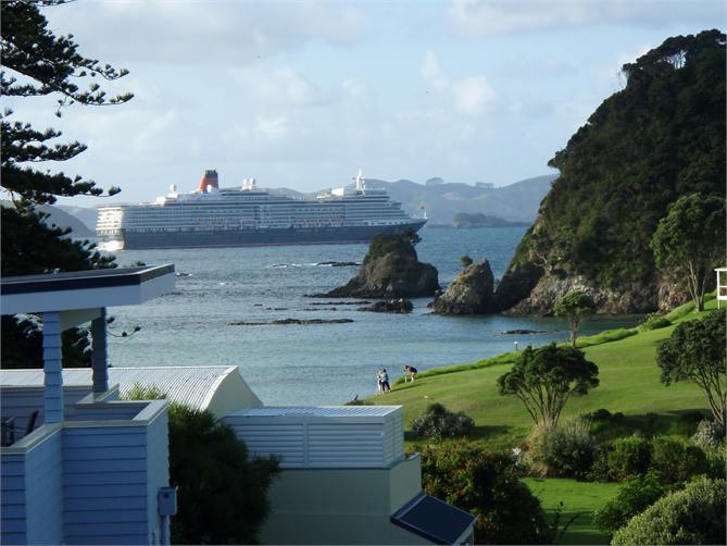 Queen Elizabeth cruises by