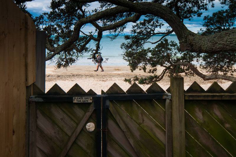 Gate opens onto the sand