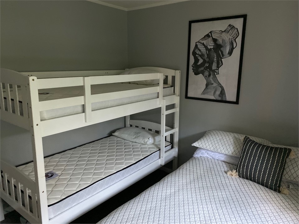 Queen and bunk beds
