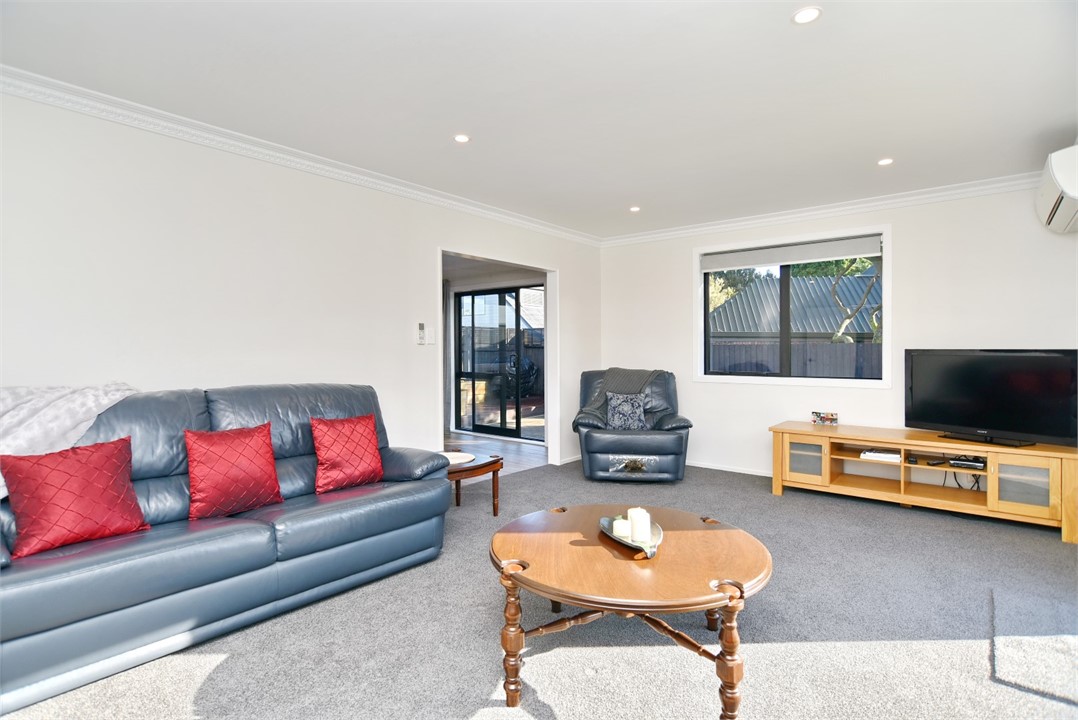 Living area with a TV and a sitting area