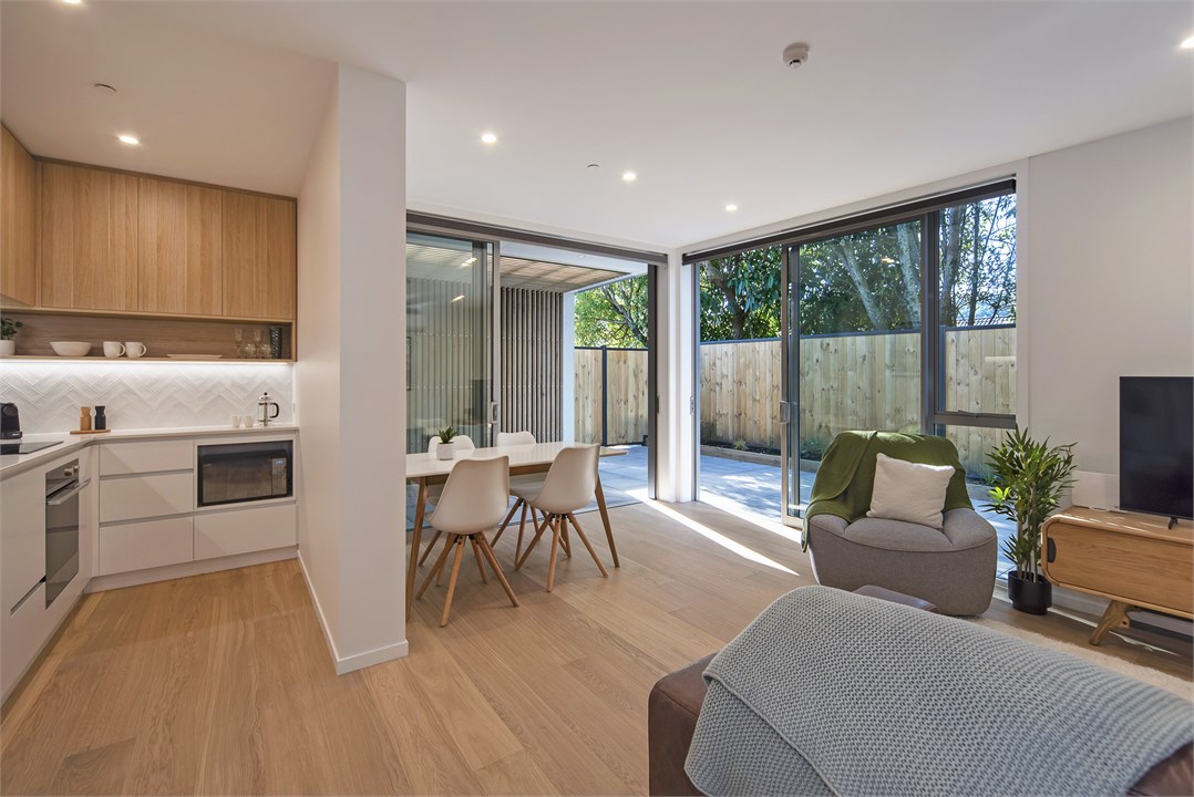 Kitchen-Dining-Living opening to outdoor areas