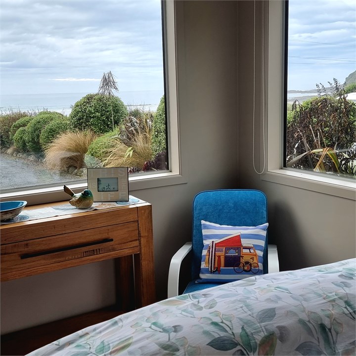 Bedroom has views out to sea