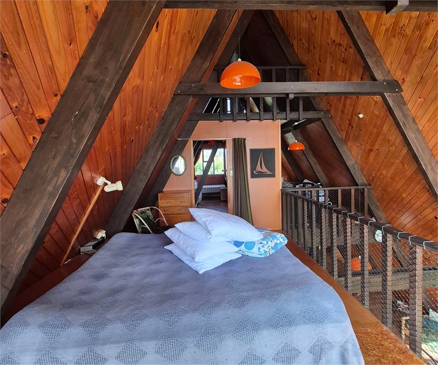 Main bedroom with balcony, beach facing