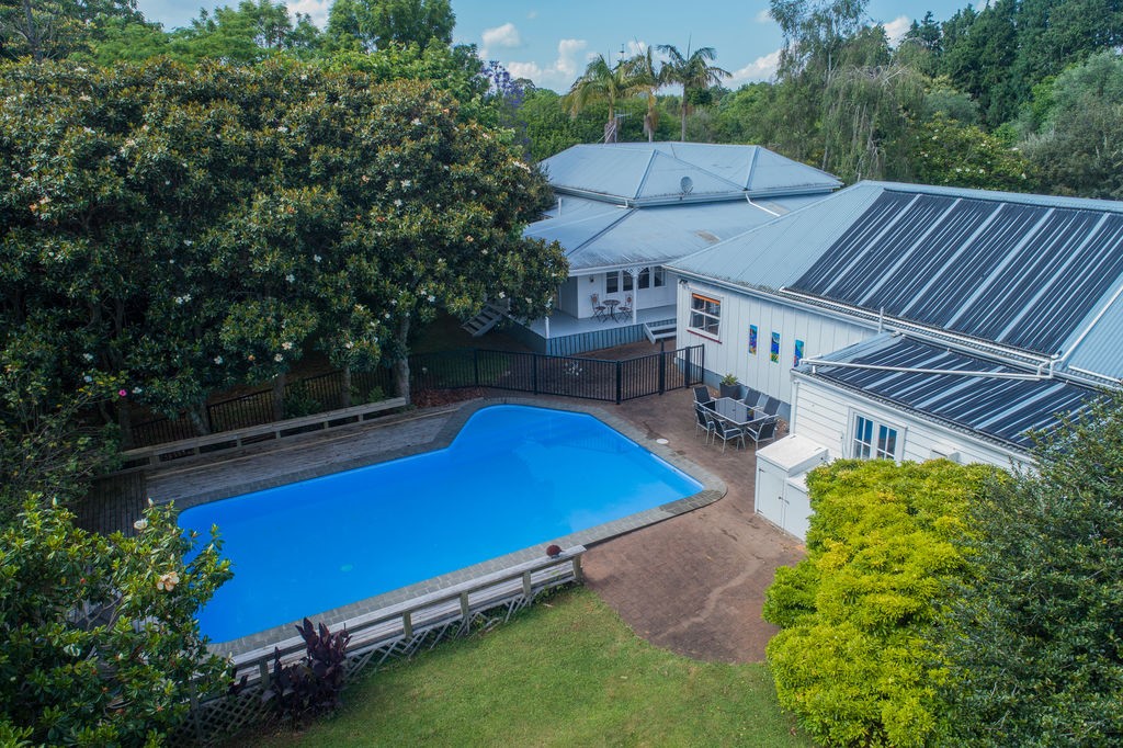 View of pool and house