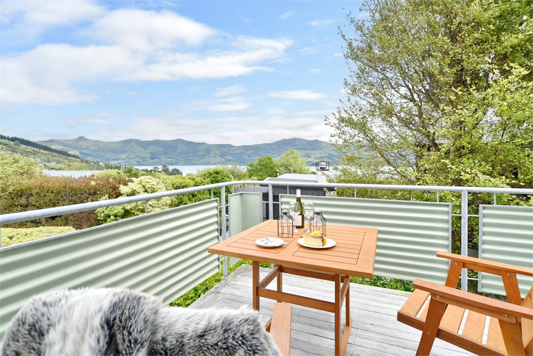 Seating area on the balcony and mountain view
