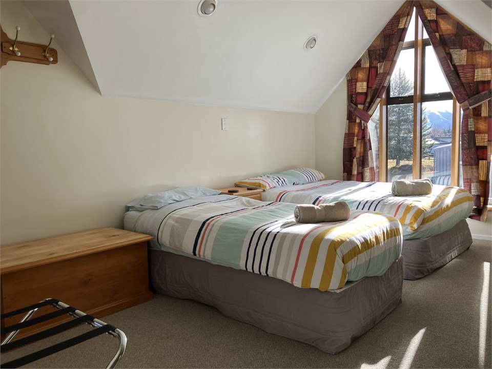 Open plan bedroom - double and single bed