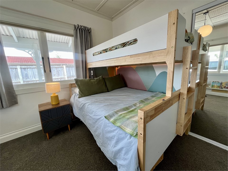 Bunk with double on bottom, single on top.