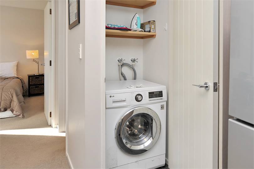 Washing machine/dryer in the cupboard