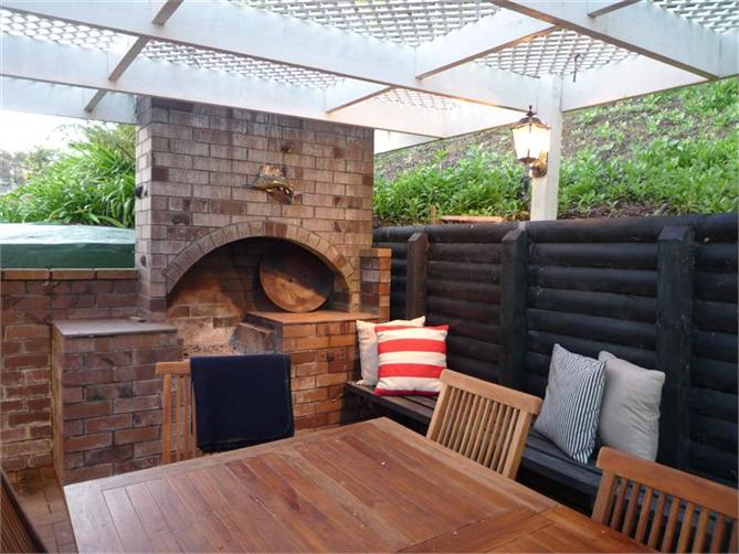Second outdoor bbq area sheltered with a roof