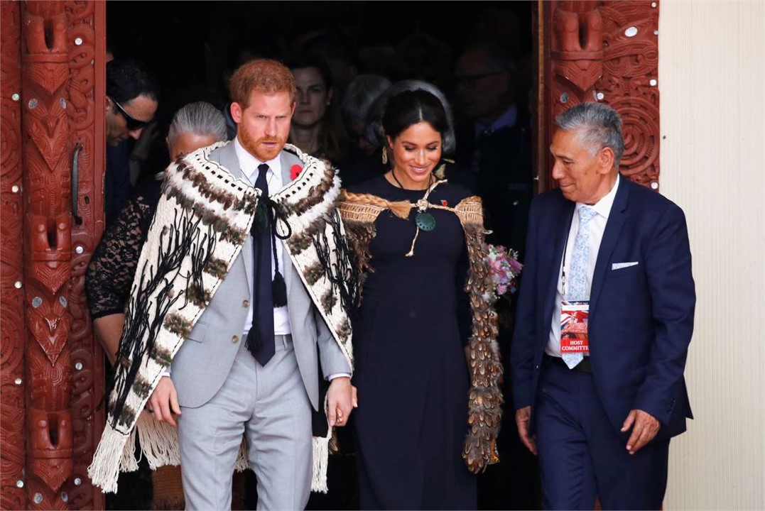 Harry & Meghan emerging from Tamatekapua 2018