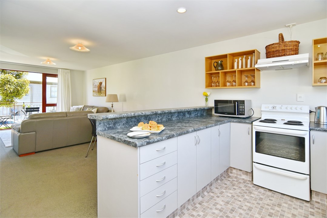 Kitchen with Dining area and Living Room