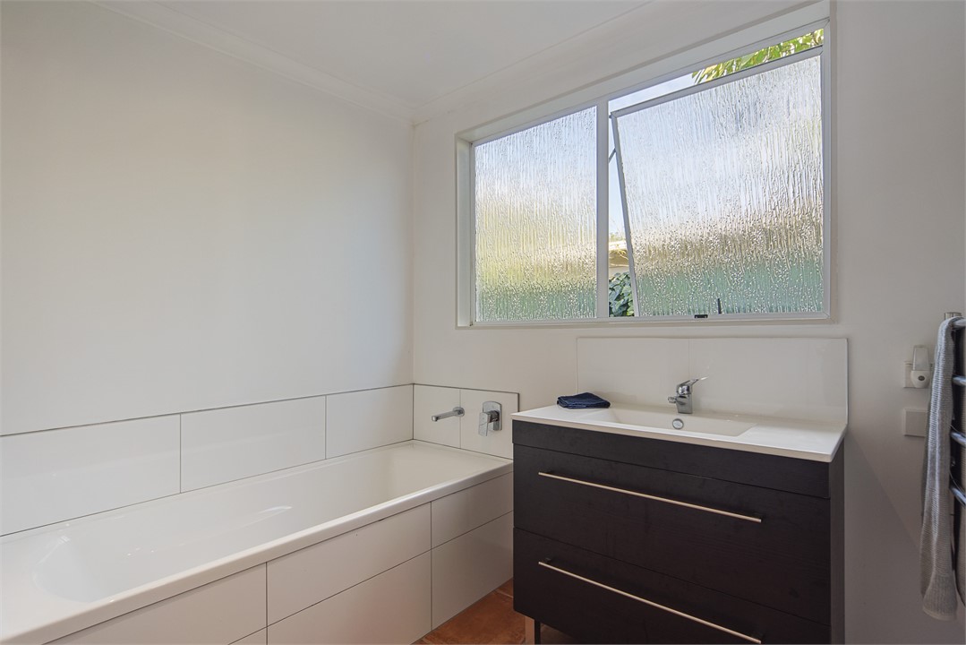 Bathroom with Bath & Separate Shower & Laundry