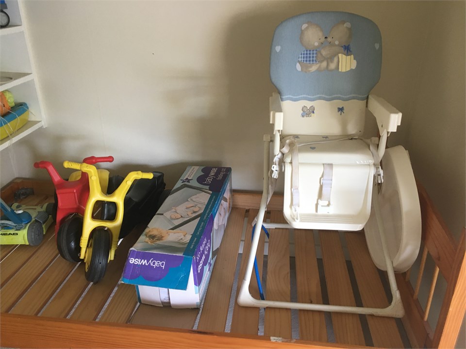 High chair, Portacot, Toys stored in garage